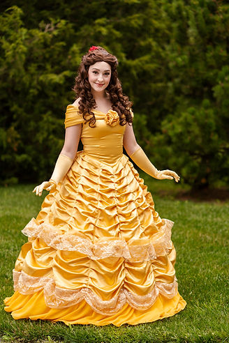 Beauty princess character in gold ballgown