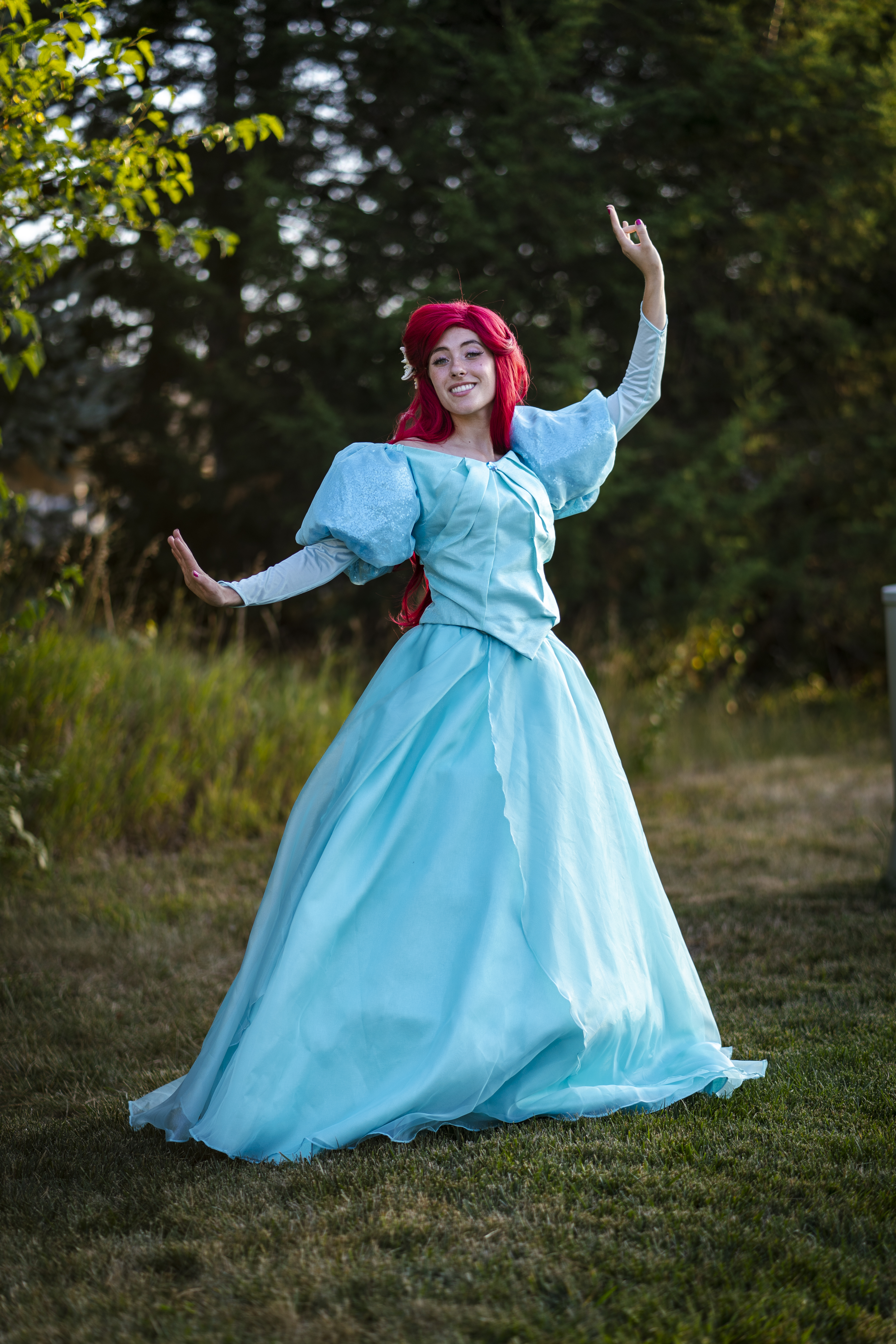 Little Mermaid character in teal costume