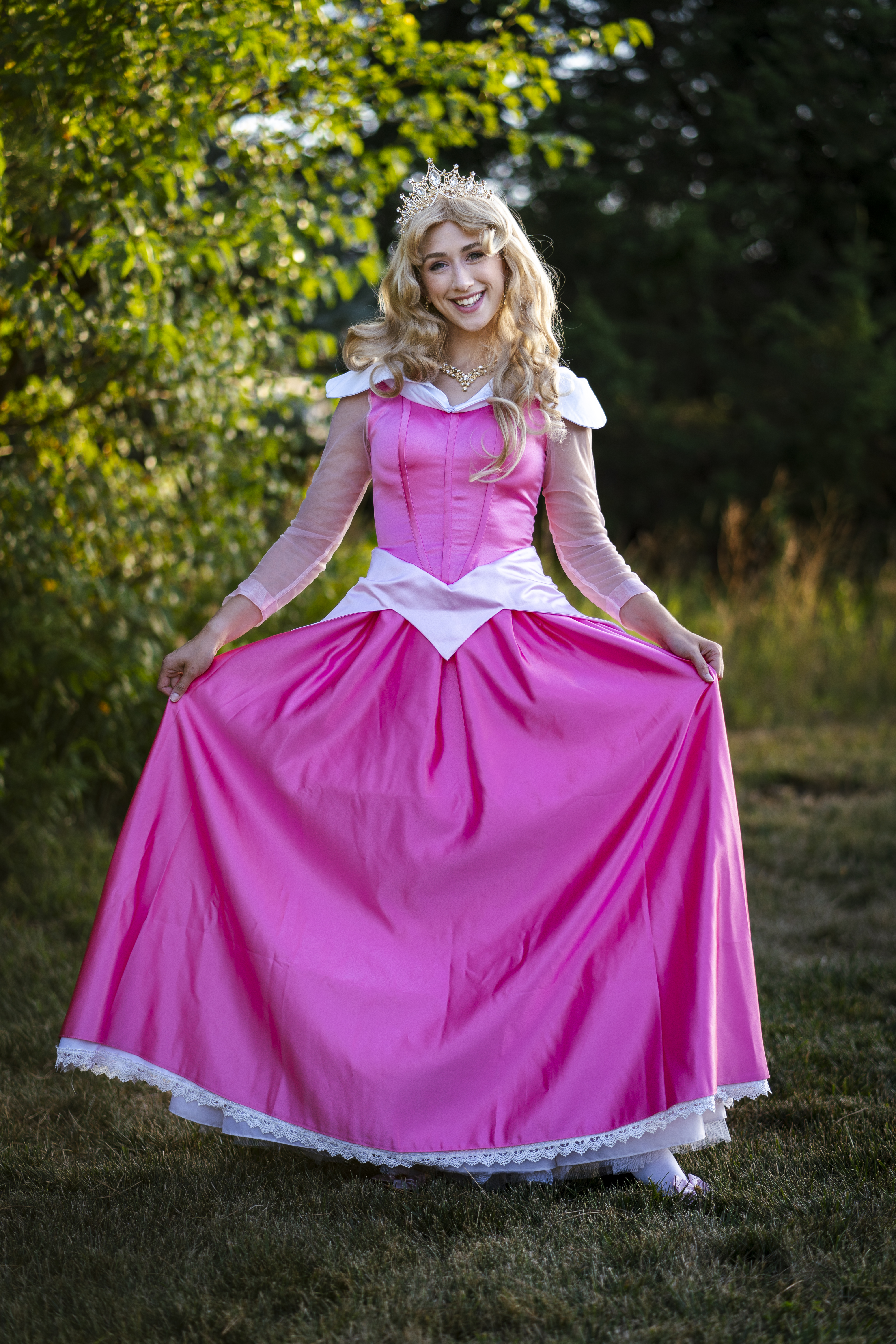 Sleeping Beauty character in pink ballgown