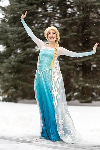 Snow Queen character in silver and white gown